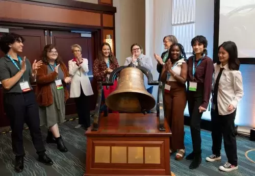 MHA President and CEO Schroeder Stribling rings the Mental Health Bell with the Youth Mental Health Leadership Council