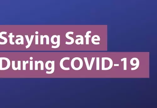 Staying Safe During COVID-19 Text on Gradient Background